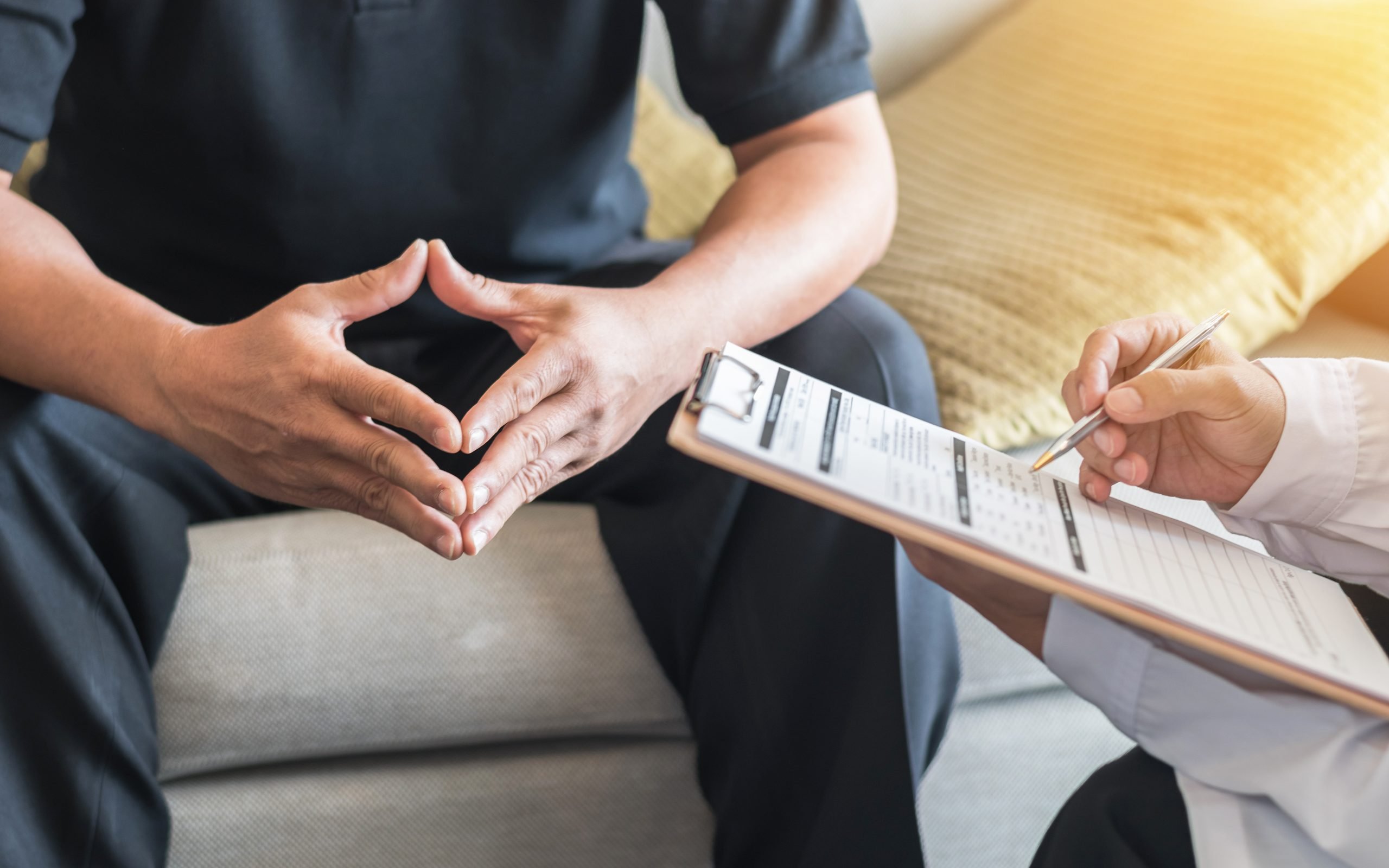 worker and employer reviewing mental health of worker